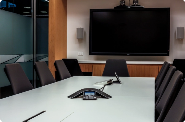 Meeting room of an office with audio visual elements installed by Telco Data.