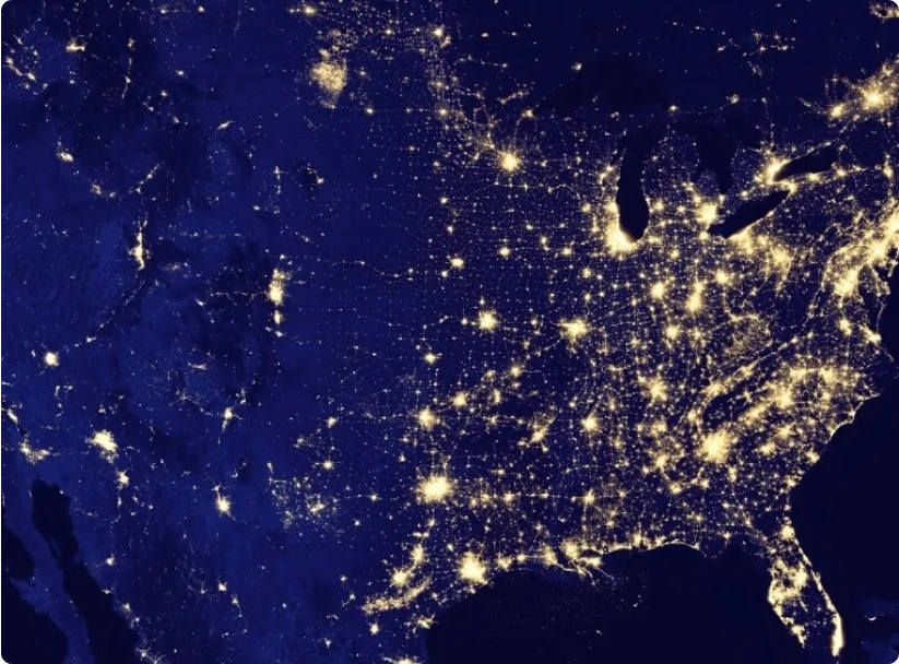 View of the United States from space. Lights can be seen in major metro areas.